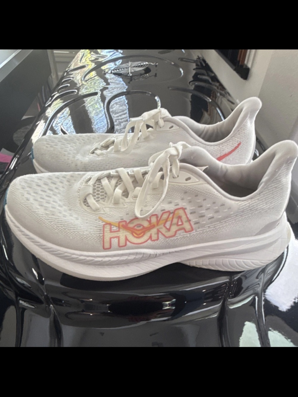 Hoka Women's White Running Shoes with coral Logo